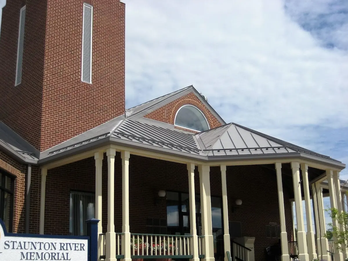 Skilled roofing craftsmen working on a residential roof in Redland